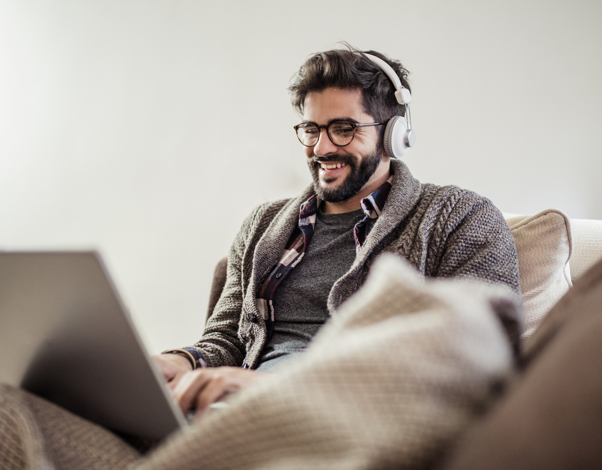 Professional working remotely on a laptop representing flexible work and long-term career growth.