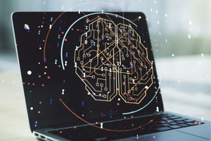 laptop with a machine learning diagram overlay