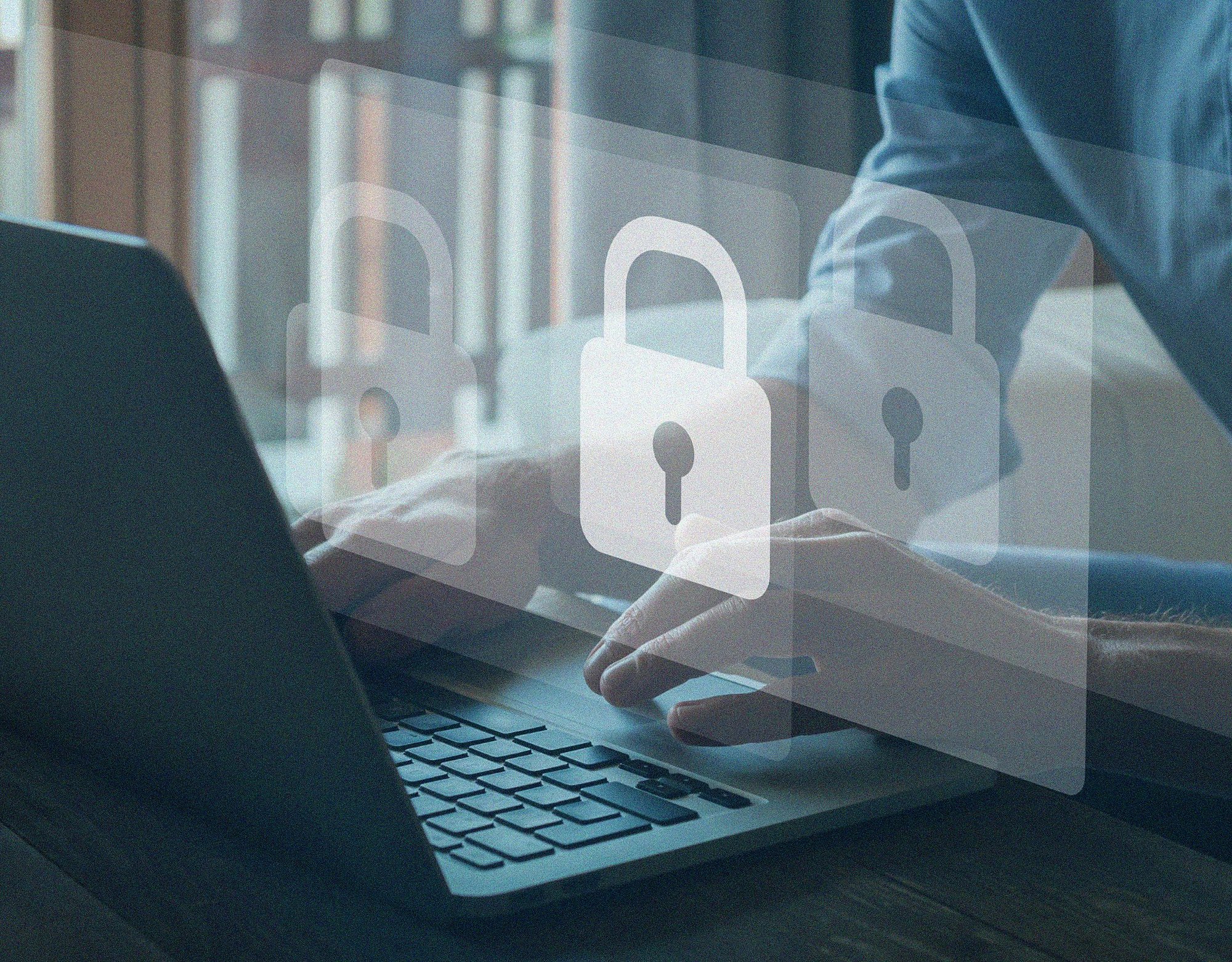 Laptop displaying digital security lock icons representing cybersecurity protection and secure platform operations.