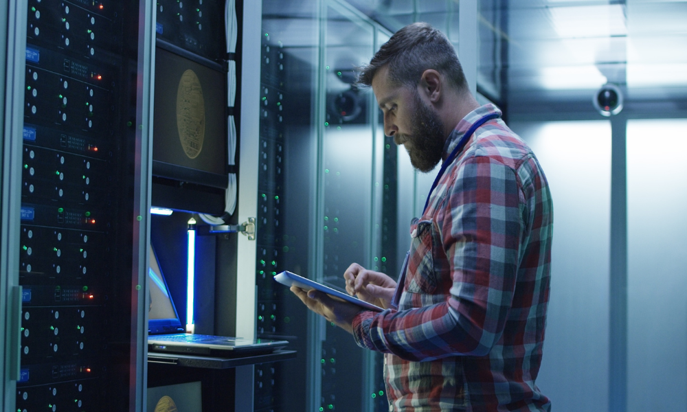 white man in a data center