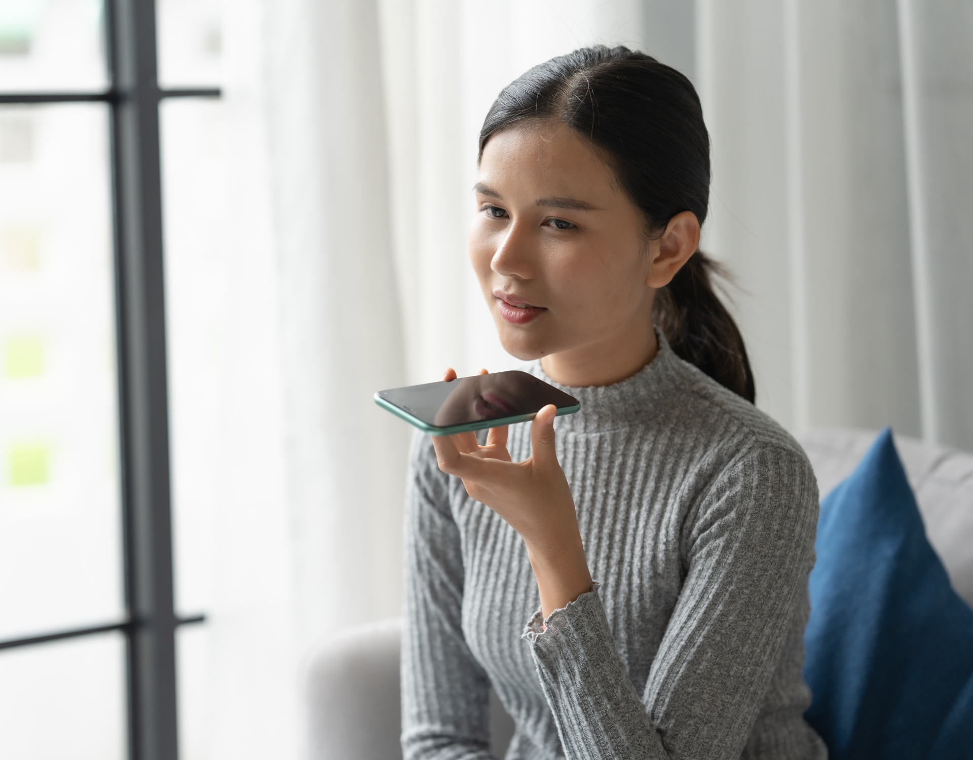 young female talking on the phone
