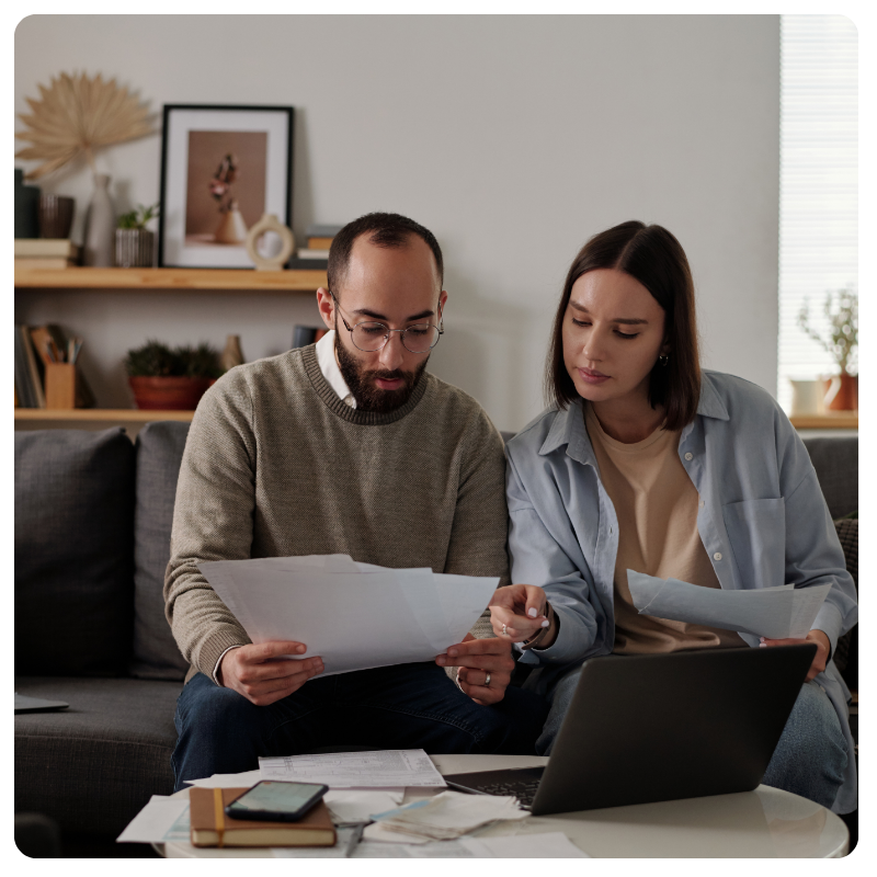 a couple reviewing their bills