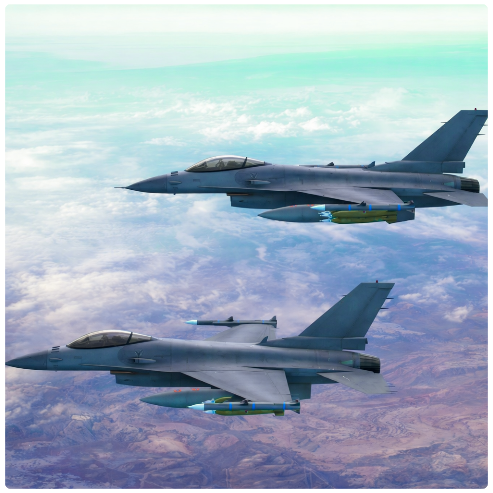 two air force jets flying over a purple sky