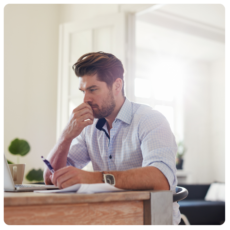 young white male thinking looking at a laptop young white male thinking looking at a laptop